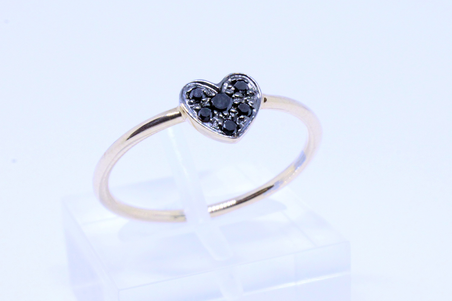 Rose gold heart ring with black diamonds