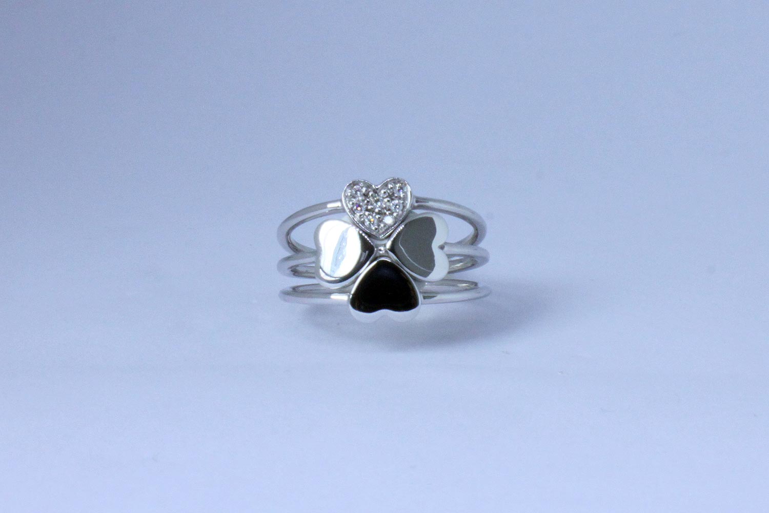 White gold heart ring complete with diamonds